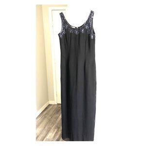 Long blue gown dress with embroidered details